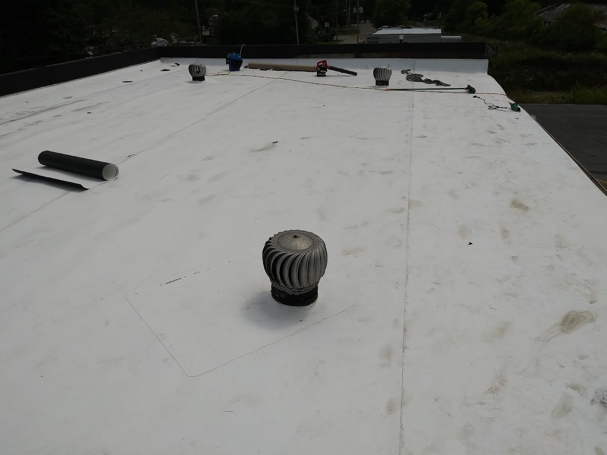 Flat-roof installation by Sunrise Roofing